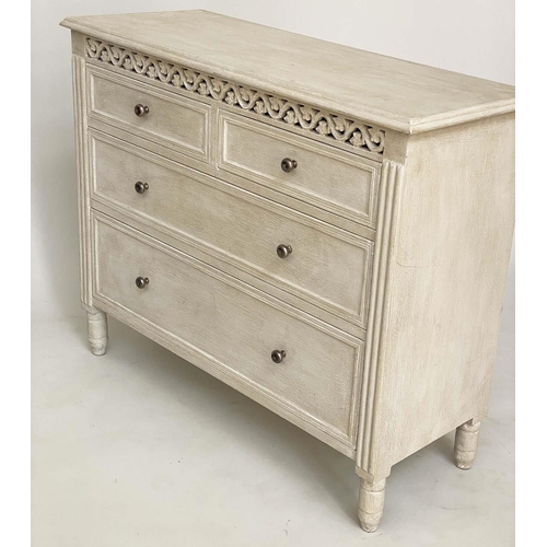 215 - COMMODE, French style traditionally grey painted with pierced frieze and four drawers, 75cm H x 89cm... 