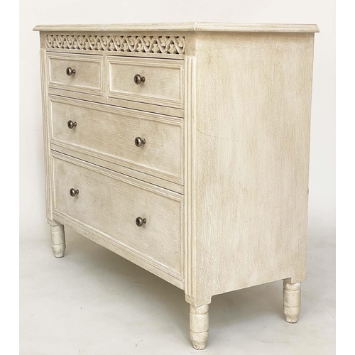 215 - COMMODE, French style traditionally grey painted with pierced frieze and four drawers, 75cm H x 89cm... 