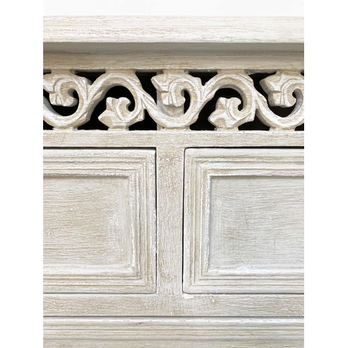 215 - COMMODE, French style traditionally grey painted with pierced frieze and four drawers, 75cm H x 89cm... 