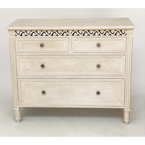 215 - COMMODE, French style traditionally grey painted with pierced frieze and four drawers, 75cm H x 89cm... 