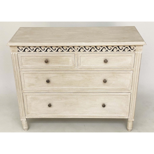 215 - COMMODE, French style traditionally grey painted with pierced frieze and four drawers, 75cm H x 89cm... 