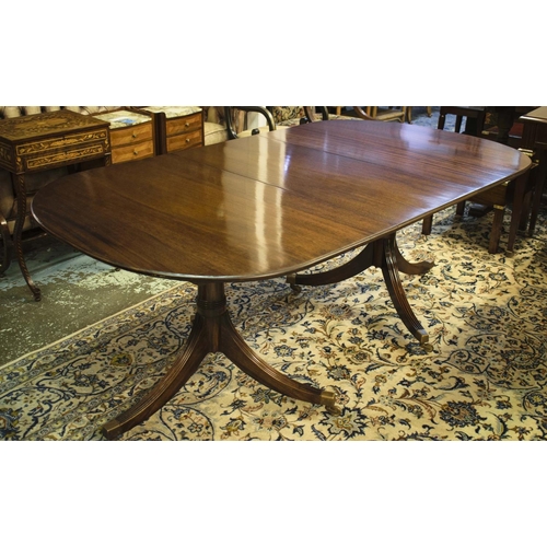 290 - TWIN PEDESTAL DINING TABLE, Regency mahogany with two leaves and brass castors, 73cm H x 107cm W x 1... 