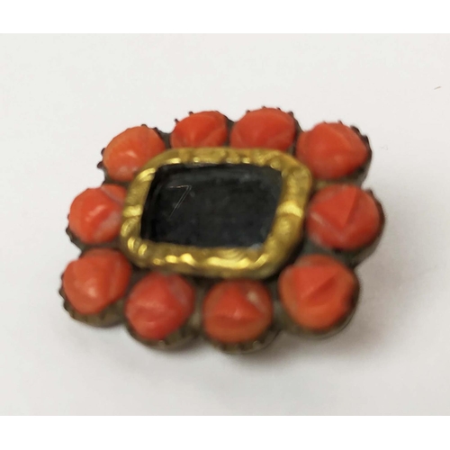 34 - A COLLECTION OF JEWELLERY, comprising an early 19th Century mourning brooch, carved coral cabouchons... 