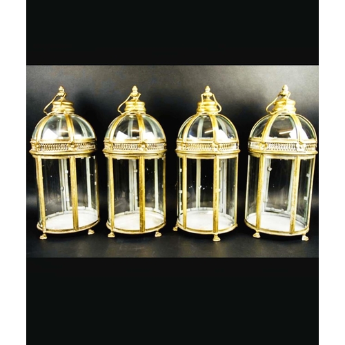 423 - STORM LANTERNS, a set of four, Regency style, gilt metal, 46cm H x 19cm diam. (4)