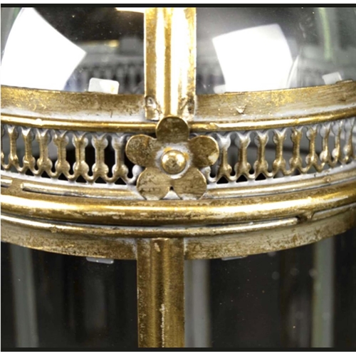 423 - STORM LANTERNS, a set of four, Regency style, gilt metal, 46cm H x 19cm diam. (4)