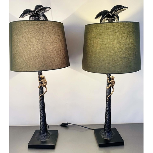 424 - TABLE LAMPS, a pair, 84cm high x 36cm diam, in the form of palm trees with climbing monkeys, with sh... 