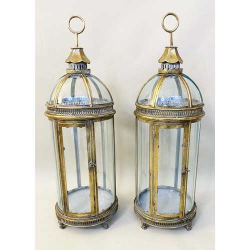 426 - STORM LANTERNS, pair, 80cm high, 28cm diameter, Regency style, gilt metal and glass. (2)