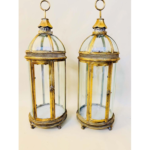 426 - STORM LANTERNS, pair, 80cm high, 28cm diameter, Regency style, gilt metal and glass. (2)