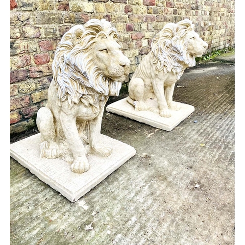 428 - SCULPTURAL LIONS, a pair, composite stone, 69cm H. (2)