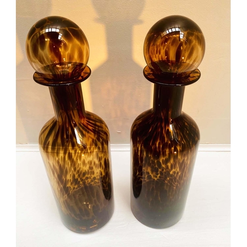 446 - DECANTERS, a pair, 53cm H x 14cm diam., Murano style tortoiseshell glass. (2)