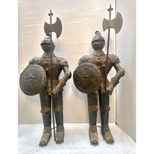 455 - FAUX SUITS OF ARMOUR, a pair, 140cm high, 55cm diameter, antiqued finish. (2)