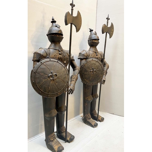 455 - FAUX SUITS OF ARMOUR, a pair, 140cm high, 55cm diameter, antiqued finish. (2)