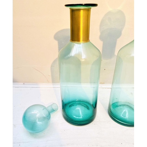 456 - MURANO STYLE GLASS DECANTERS, 52cm high, 16cm diameter, a pair, turquoise glass with gilt collars. (... 