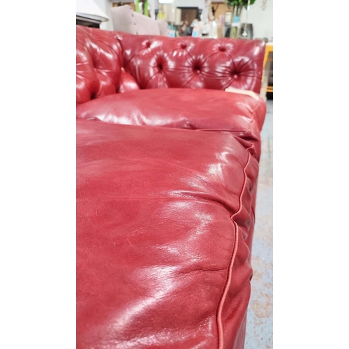 468 - CHESTERFIELD STYLE SOFA, red leather upholstered, 190cm W.