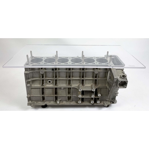 475 - JAGUAR A526/A526 FOUR LITRE ENGINE BLOCK TABLE, with raised rectangular acrylic top, 90cm L x 45cm W... 