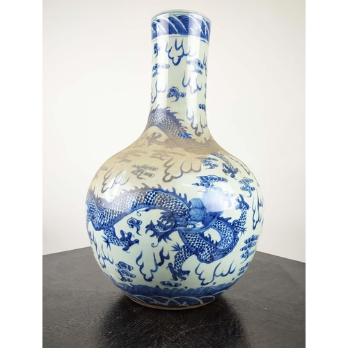 489 - BOTTLES VASES, a pair, Chinese Export style blue and white ceramic, 60cm H. (2)