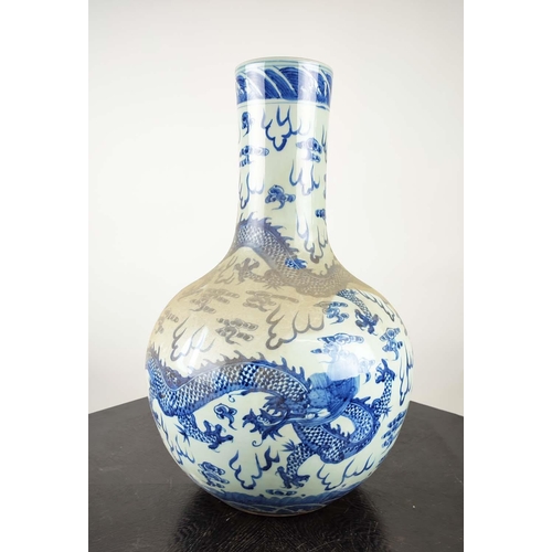 489 - BOTTLES VASES, a pair, Chinese Export style blue and white ceramic, 60cm H. (2)