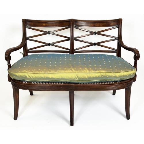 163 - THEODORE ALEXANDER SETTEE, Regency design, caned seat with silk squab cushion, retailed by Brights o... 