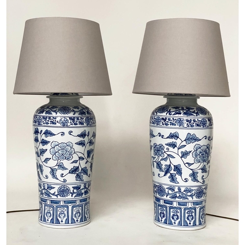 182 - TABLE LAMPS, a pairs, Chinese blue and white ceramic of lidded vase form, with shades, 75cm H. (2)