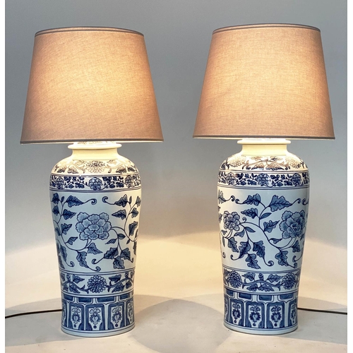 182 - TABLE LAMPS, a pairs, Chinese blue and white ceramic of lidded vase form, with shades, 75cm H. (2)