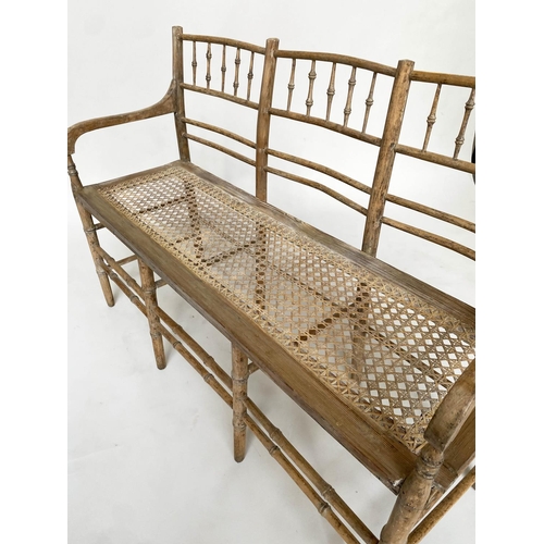 224 - FAUX BAMBOO HALL SEAT, 19th century English carved faux bamboo framed with down swept arms and cane ... 