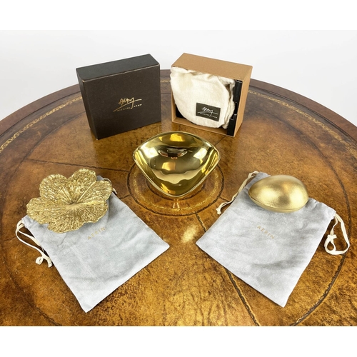 44 - AERIN CREAM SHAGREEN COASTERS, a boxed set of four with suede underside and gold toned brass rim alo... 