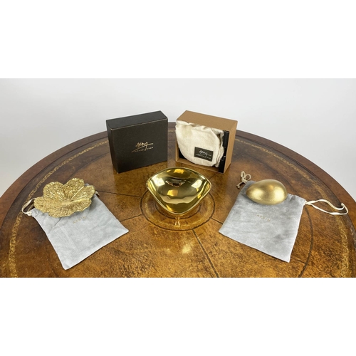 44 - AERIN CREAM SHAGREEN COASTERS, a boxed set of four with suede underside and gold toned brass rim alo... 