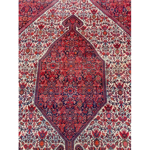 137 - ANTIQUE PERSIAN FEREGHAN RUG, 196cm x 127cm.