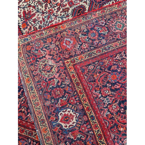 137 - ANTIQUE PERSIAN FEREGHAN RUG, 196cm x 127cm.