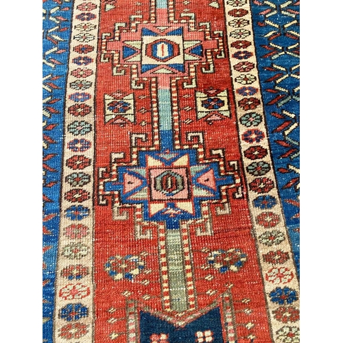 141 - ANTIQUE PERSIAN BAKSHAISH RUNNER, 331cm x 91cm.