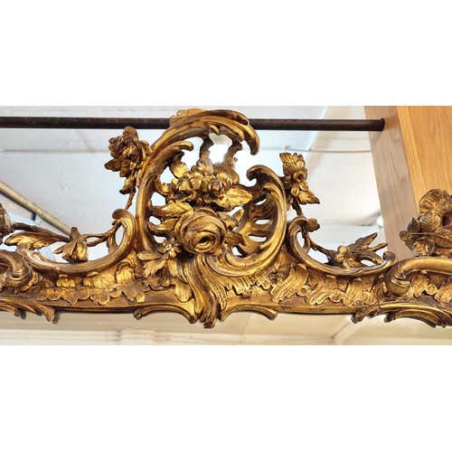 225 - WALL MIRROR, 170cm H x 122cm mid Victorian giltwood and gesso with Rococo manner foliate decorated f... 