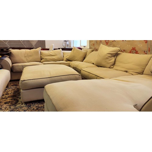 482 - COLLINS & HAYES MODULAR SOFA, neutral upholstered with grey piping approx 390cm x 280cm x 200cm and ... 