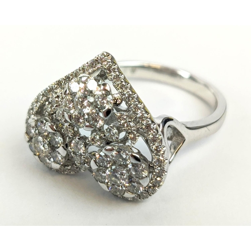 11 - AN 18CT WHITE GOLD DIAMOND DRESS RING, the head in the form of a heart, encrusted with round brillia... 