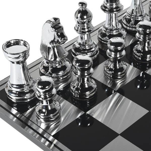 437 - OVERSIZED CHESS SET, black and silver chequered board, 60cm x 60cm, with silver and gold chess piece... 