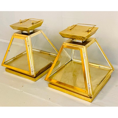 441 - WALL HANGING LANTERNS, pair, 31cm high, 29cm wide, pyramid form, gilt metal frames and glass sides. ... 