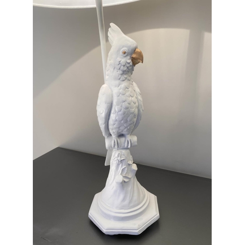 482 - TABLE LAMPS, a pair, in the form of cockatoos, with shades, 
76cm x 38cm x 38cm. (2)