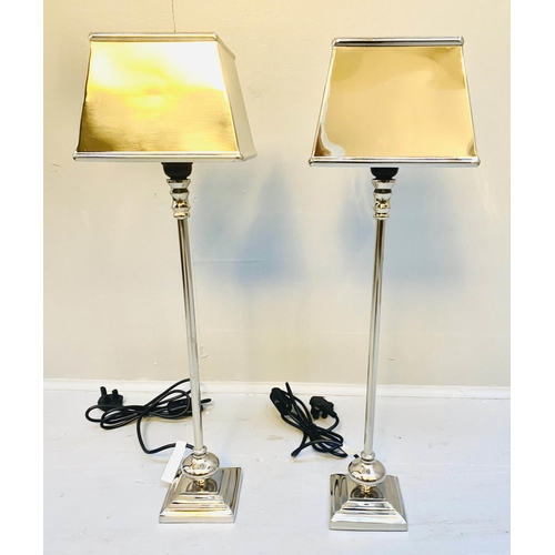 478 - LIBRARY TABLE LAMPS, 59cm high, a pair, polished metal.