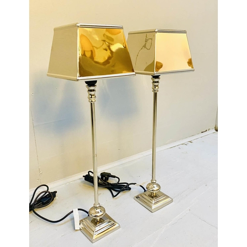 478 - LIBRARY TABLE LAMPS, 59cm high, a pair, polished metal.