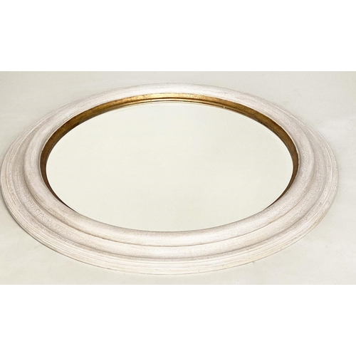 229 - WALL MIRROR, circular beveled within a deep grey frame with gilt slip, 91cm W.