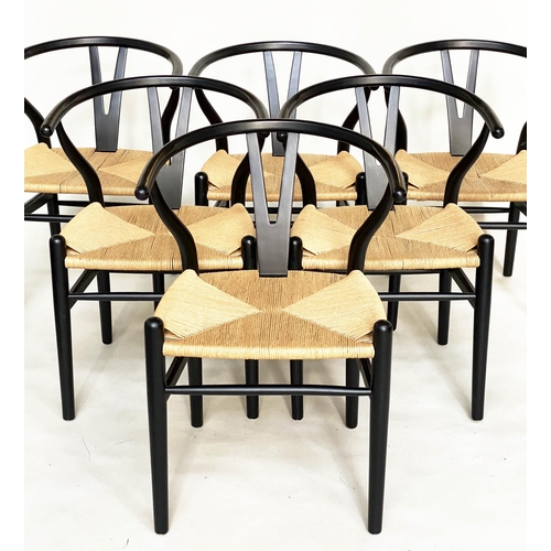 267 - AFTER HANS J WEGNER WISHBONE STYLE CHAIRS, a set of six, with rush seats. (6)