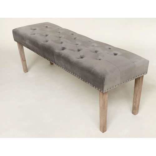 277 - WINDOW SEAT, rectangular deep buttoned velvet upholstered and brass slidded with tapering limed oak ... 