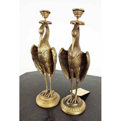 1 - HERON CANDLESTICKS, a pair, Victorian aesthetic style, gilt metal, 41cm H. (2)