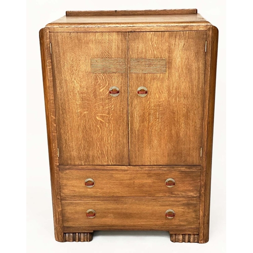 116 - ART DECO CABINET, limed oak with two panel doors enclosing shelves above two drawers, 90cm W x 125cm... 