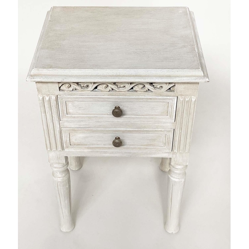 132 - BEDSIDE CHESTS, a pair, French style traditionally grey painted each with two drawer and pierced fri... 