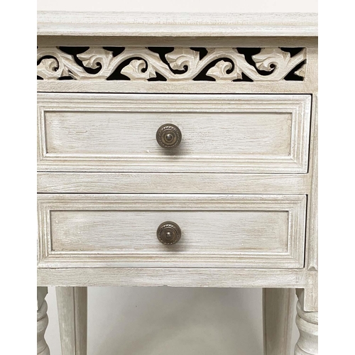 132 - BEDSIDE CHESTS, a pair, French style traditionally grey painted each with two drawer and pierced fri... 