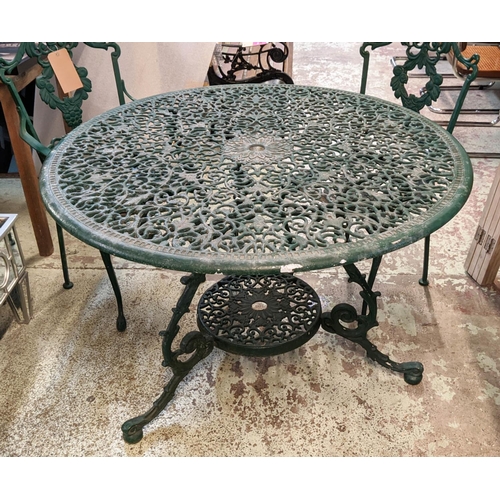 133 - GARDEN TABLE AND FOUR CHAIRS, Victorian style, green table painted, 71cm H x 109cm diam, chairs 88cm... 