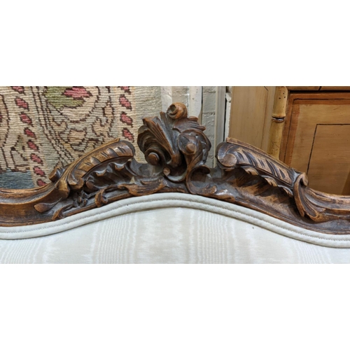 215 - BERGERE A OREILLES, 74cm W x 113cm H, 19th century French walnut carved showframe, with light blue s... 