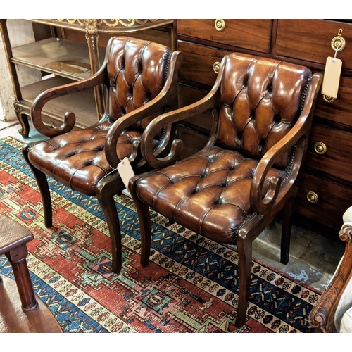 216 - PAIR OF BROWN LEATHER BUTTONED ARMCHAIRS, each 51cm W mahogany. (2)