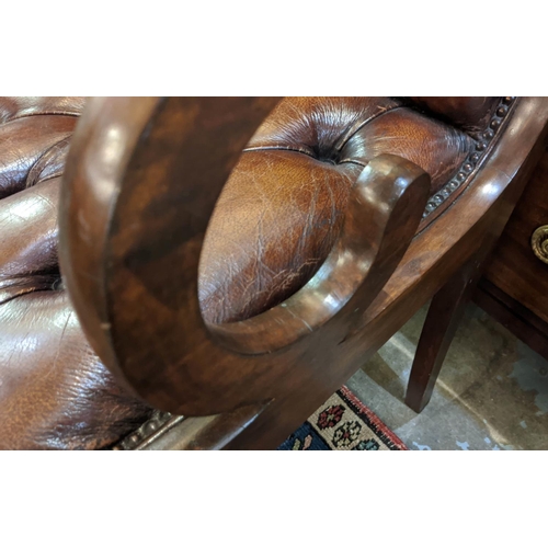 216 - PAIR OF BROWN LEATHER BUTTONED ARMCHAIRS, each 51cm W mahogany. (2)