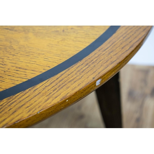 284 - LOW TABLES, 42cm H x 90cm D, a pair, oak with circular ebonised banded tops on brass capped legs. (2... 